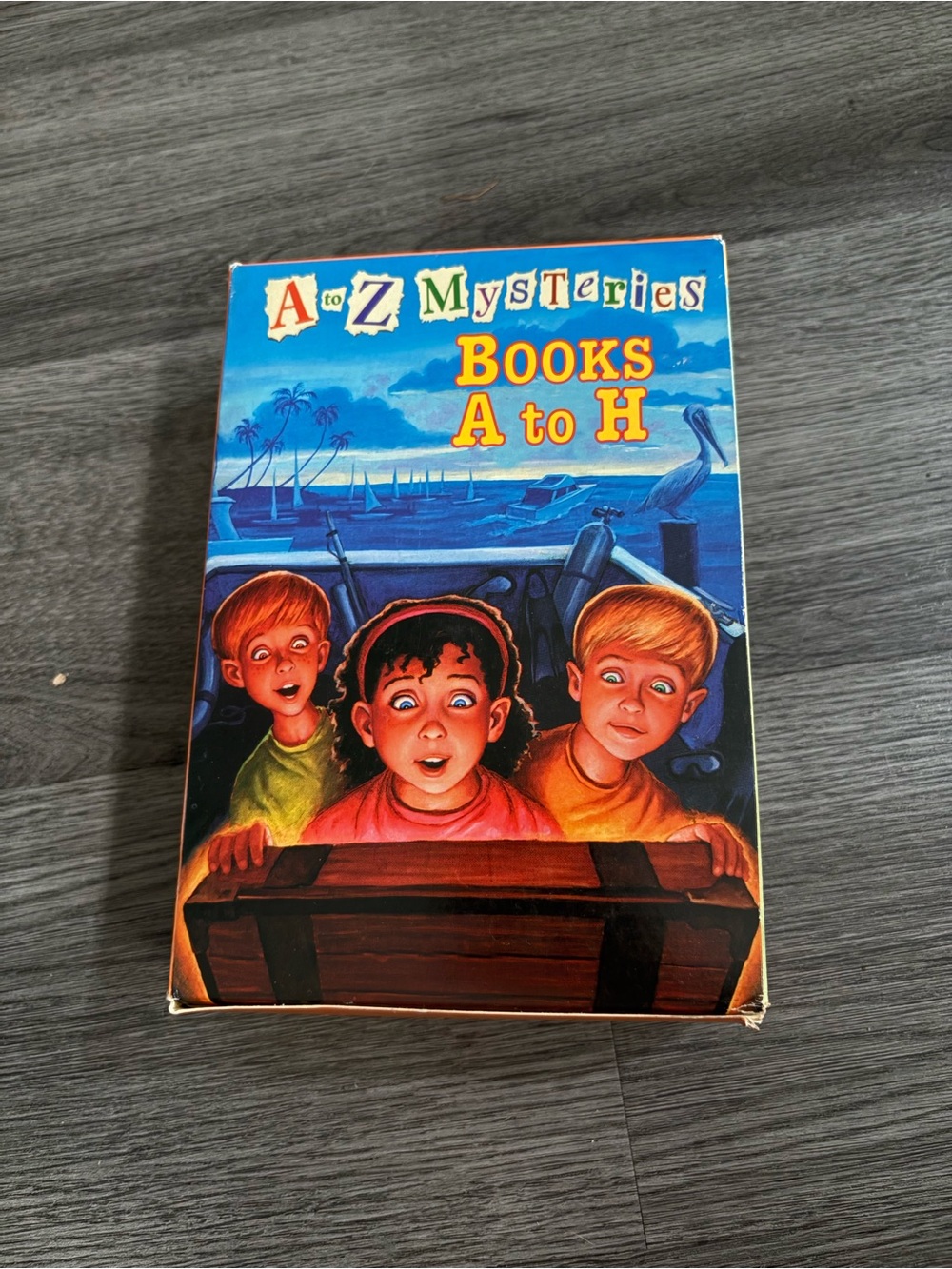 Scholastic Blue Box Set with Colorful Illustration - A to H Mysteries